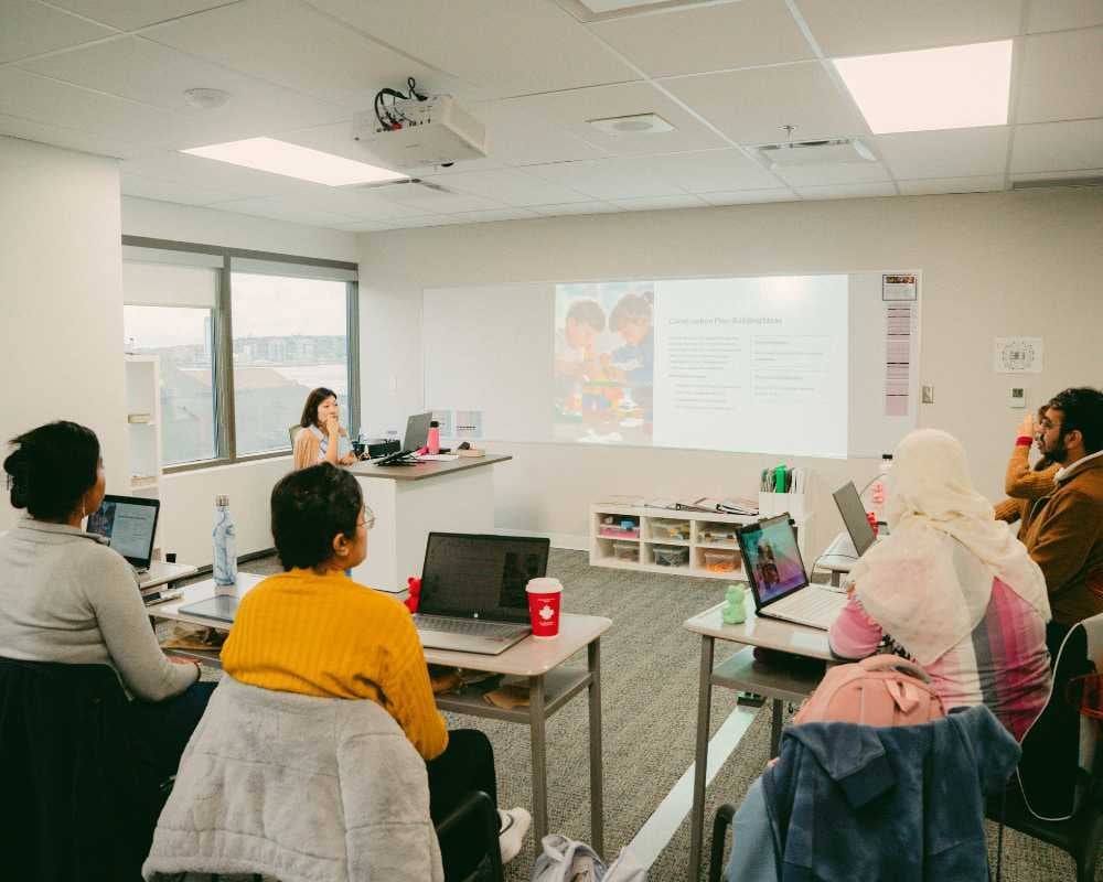 OICC ECE instructor with students in class
