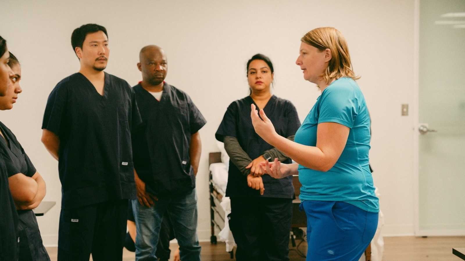 CCA instructor and student in class